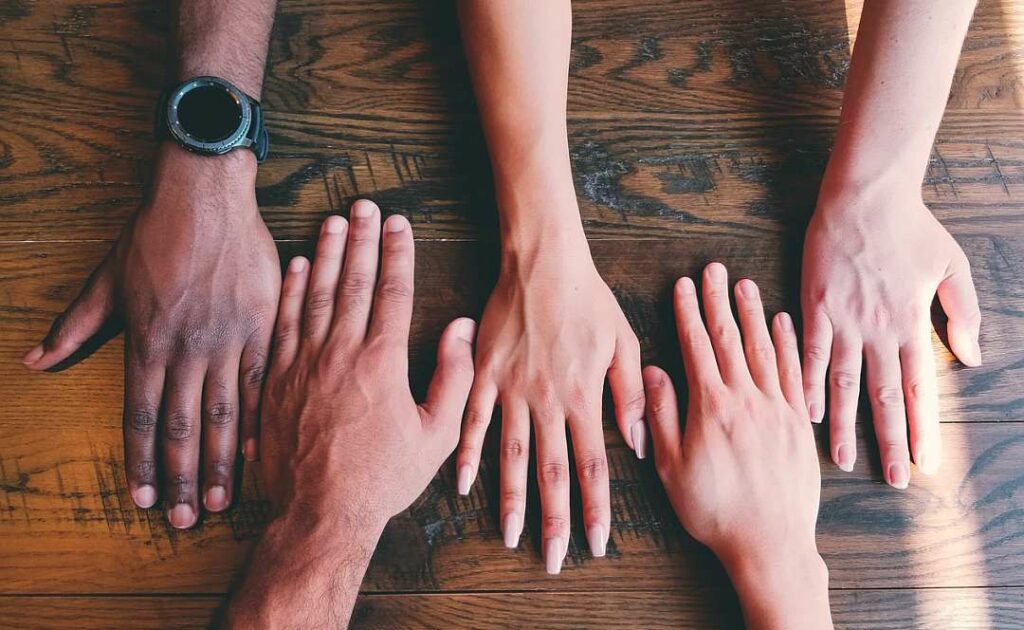 What is an all-hands meeting and how to run one - photo by Clay Banks on Unsplash
