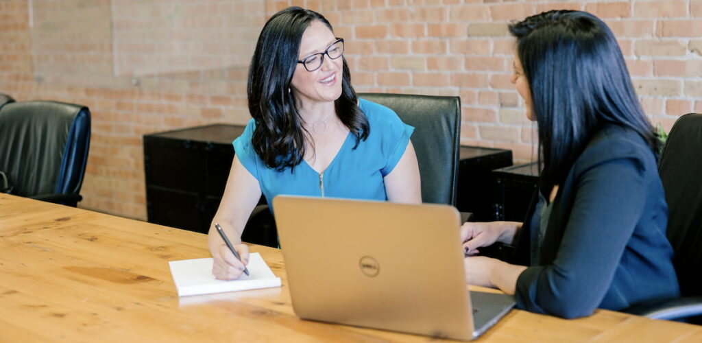 One-on-one meetings are part of Point Jupiter experience. Photo by Amy Hirschi on Unsplash.